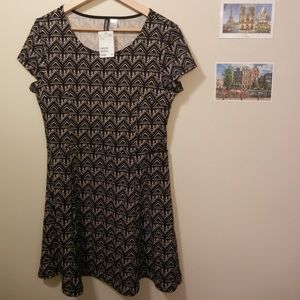 Geometric black and white skater dress